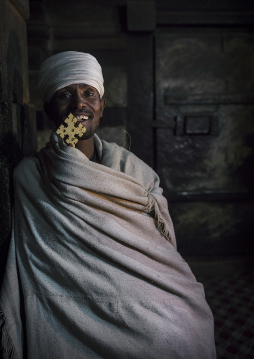 Reverend Taklu Melkamu, Yemrehana Krestos Rock Church, Lalibela, Ethiopia