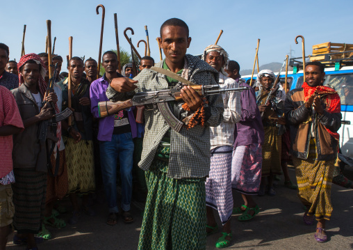 Oromo man with a kalashnikov during a wedding celebration, Oromo, Sambate, Ethiopia