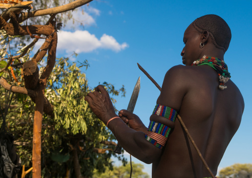 Hamer tribe whipper during a bull jumping ceremony, Omo valley, Turmi, Ethiopia