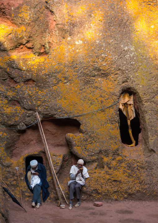 Ethiopian priests in a rock church during kidane mehret orthodox celebration, Amhara region, Lalibela, Ethiopia