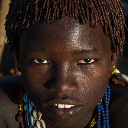Portrait of a hamer tribe teenage girl, Omo valley, Turmi, Ethiopia
