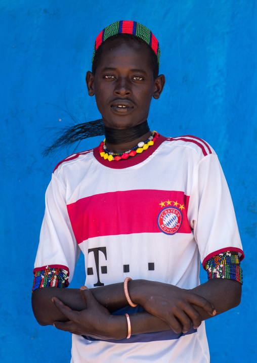 Portrait of a hamer tribe man with bayern munich football shirt, Omo valley, Turmi, Ethiopia