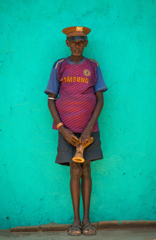 Portrait of a hamer tribe old man with chelsea football shirt, Omo valley, Turmi, Ethiopia