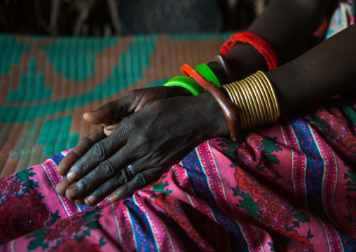Toposa tribe woman bracelets, Omo valley, Kangate, Ethiopia