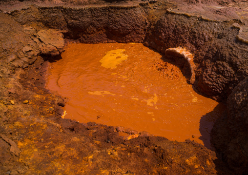 Ochre acid lake in the danakil depression, Afar region, Dallol, Ethiopia