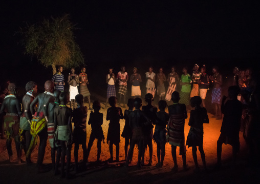 Hamer tribe people dancing at night, Omo valley, Turmi, Ethiopia
