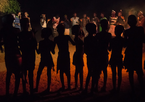 Hamer tribe people dancing at night, Omo valley, Turmi, Ethiopia