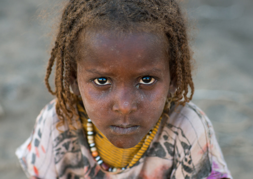 Portrait of an afar tribe girl with braided hair, Afar region, Afambo, Ethiopia