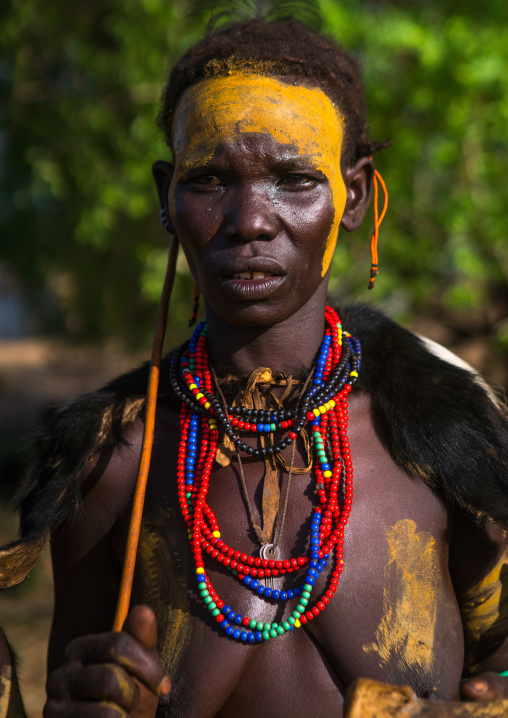 Portrait of a dassanech tribe woman during dimi ceremony, Omo valley, Omorate, Ethiopia