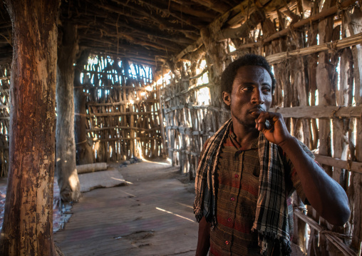 Afat tribe imam inside a wooden mosque, Afar region, Afambo, Ethiopia