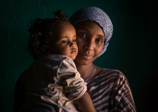 Sufi mother with her baby, Harari region, Harar, Ethiopia