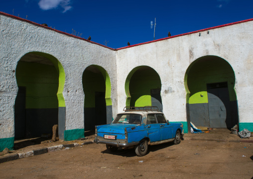 Peugeot 404 taxi in the market of the old town, Harari region, Harar, Ethiopia