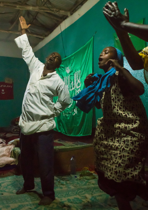 Sufi people go into a trance during a ceremony, Harari region, Harar, Ethiopia