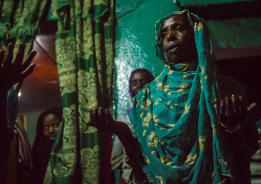 Sufi women go into a trance during a ceremony, Harari region, Harar, Ethiopia