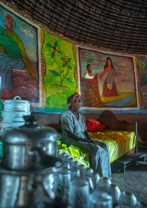 Ethiopia, Kembata, Alaba Kuito, ethiopian woman inside her traditional painted and decorated house