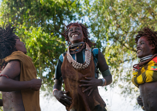 Hamer tribe women dancing during a bull jumping ceremony, Omo valley, Turmi, Ethiopia