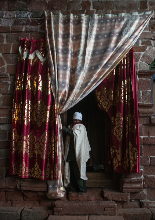Ethiopian orthodox priest in nakuto lab rock church, Amhara region, Lalibela, Ethiopia