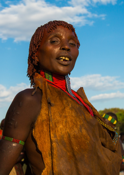 Hamer tribe woman attending a bull jumping ceremony, Omo valley, Turmi, Ethiopia