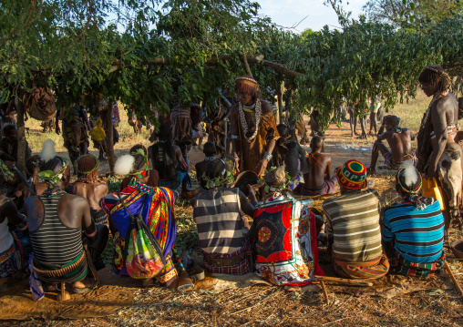 Hamer tribe elders attending a bull jumping ceremony, Omo valley, Turmi, Ethiopia
