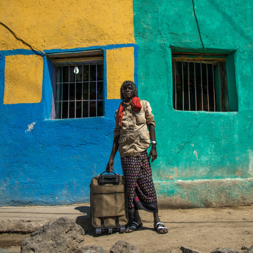Portrait of an Afar tribe man with a luggage, Afar region, Assaita, Ethiopia