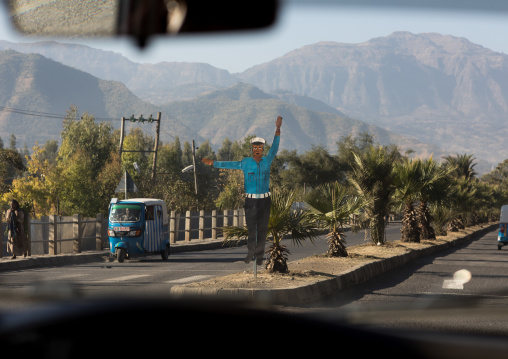 Man mannequin dressed as a policeman to reduce cars speed, Amhara region, Weldiya, Ethiopia