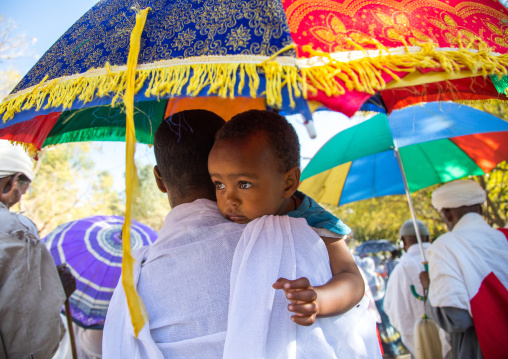 Ethiopian orthodox priests procession celebrating the colorful Timkat epiphany festival, Amhara region, Lalibela, Ethiopia