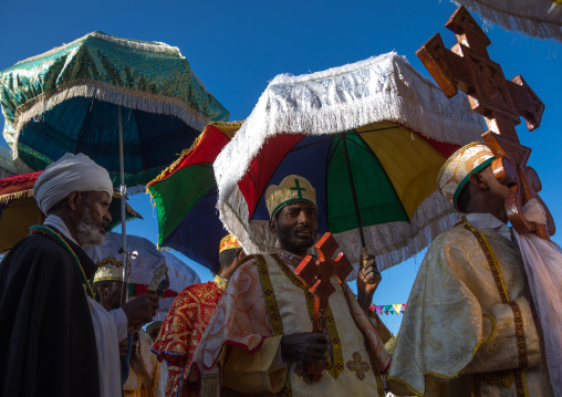 Ethiopian orthodox priests procession celebrating the colorful Timkat epiphany festival, Amhara region, Lalibela, Ethiopia