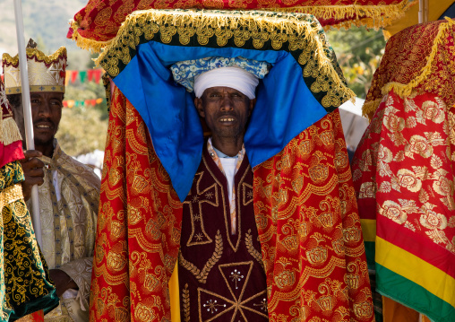 Ethiopian priest carrying a covered tabot on his head during Timkat epiphany festival, Amhara region, Lalibela, Ethiopia