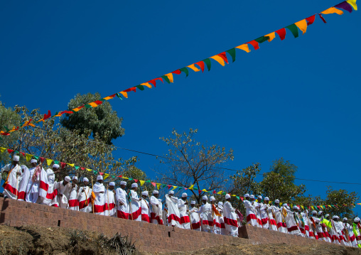 Ethiopian orthodox priests in line celebrating the colorful Timkat epiphany festival, Amhara region, Lalibela, Ethiopia