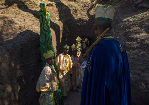 Monks taking out the crosses of Mariam rock church for Timkat celebration, Amhara region, Lalibela, Ethiopia