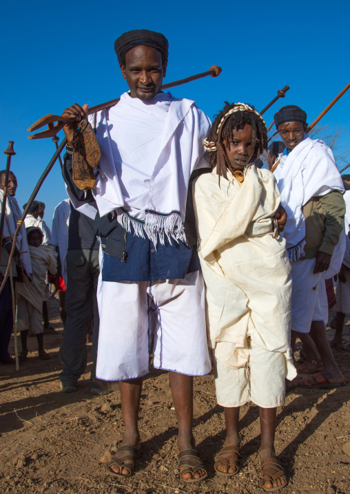 Dabale age grade boy with his father during the Gada system ceremony in Borana tribe, Oromia, Yabelo, Ethiopia