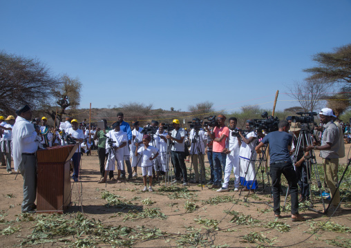 Man making a speech in front of the ethiopian press during the Gada system ceremony in Borana tribe, Oromia, Yabelo, Ethiopia