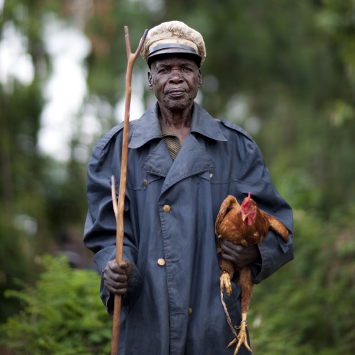 Chicken seller at tum market, Omo valley, Ethiopia