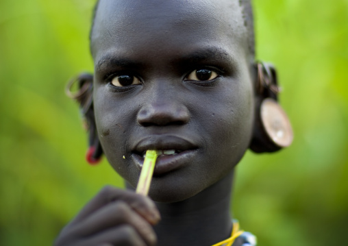 Surma girl,,Tulgit, Omo valley, Ethiopia