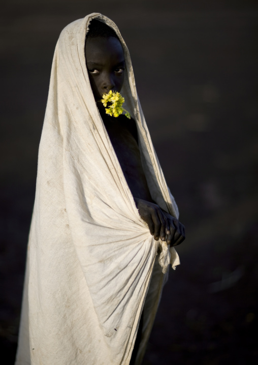 Suri Boy With A Flower In His Mouth, Turgit Village, Omo Valley, Ethiopia