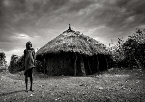 Surma Boy In Front Of A Hut, Village Of Turgit, Omo Valley, Ethiopia