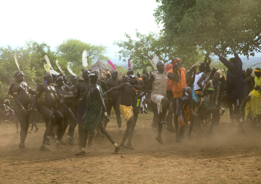 Bodi tribe fat men dancing during Kael ceremony, Omo valley, Hana Mursi, Ethiopia