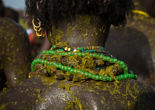 People covering themselves with cow dungs during the proud ox ceremony in the Dassanech tribe, Turkana County, Omorate, Ethiopia