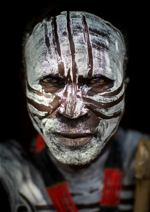 Portrait of Karo tribe man white painted face, Omo valley, Korcho, Ethiopia