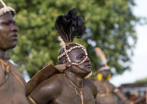Bodi tribe fat men dancing during Kael ceremony, Omo valley, Hana Mursi, Ethiopia