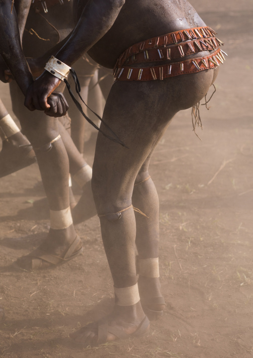 Bodi tribe fat men dancing during Kael ceremony, Omo valley, Hana Mursi, Ethiopia