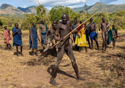 Suri tribe warriors during a donga stick fighting ritual, Omo valley, Kibish, Ethiopia