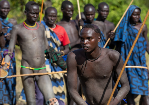Suri tribe warriors fighting during a donga stick ritual, Omo valley, Kibish, Ethiopia