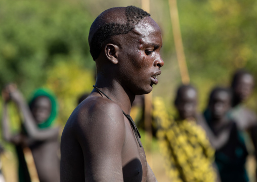 Suri tribe warrior during a donga stick fighting ritual, Omo valley, Kibish, Ethiopia