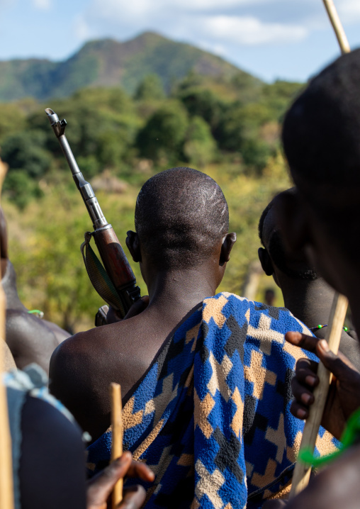 Suri tribe warriors with scars on the head during a donga stick fighting ritual, Omo valley, Kibish, Ethiopia