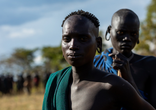 Suri tribe warriors during a donga stick fighting ritual, Omo valley, Kibish, Ethiopia