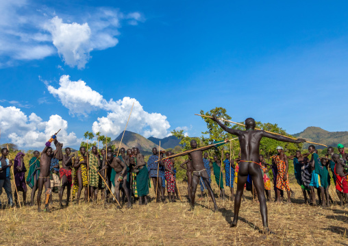 Suri tribe warriors fighting during a donga stick ritual, Omo valley, Kibish, Ethiopia