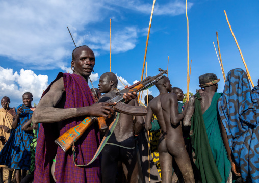 Group of suri tribe warriors during a donga stick fighting ritual, Omo valley, Kibish, Ethiopia