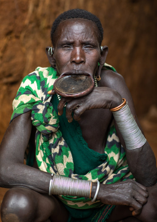 Portrait of a suri tribe woman wearing a lip plate, Omo valley, Kibish, Ethiopia