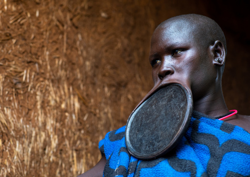 Portrait of a suri tribe woman wearing a huge lip plate, Omo valley, Kibish, Ethiopia